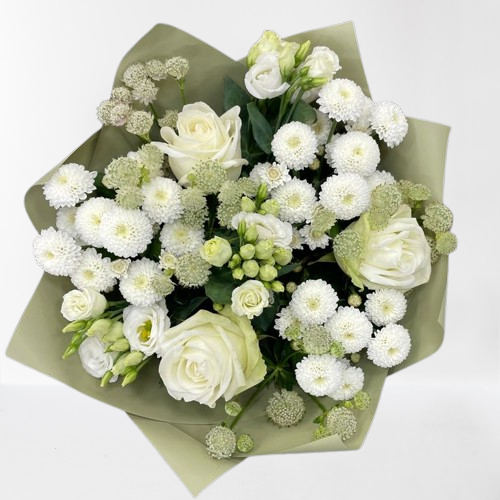 Elegant white flowers arranged in a bouquet, complemented by vibrant green leaves for a natural touch.